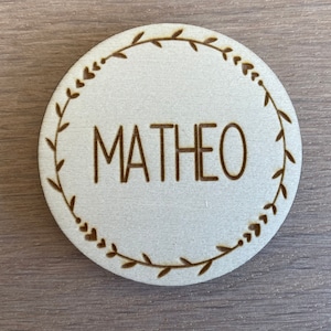 round, personalized wooden magnet with name