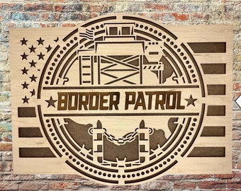 May include: A wooden sign with a brown border patrol logo featuring a tower, barbed wire, and the words "BORDER PATROL". The sign is 13.4 inches wide and 10.5 inches tall. It is customizable with a name, title, or special message.