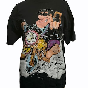 Vintage 90’s Americas Best Single Stitch Fred Flintstone Prehistoric Motorcycle Flintstones Graphic T-Shirt USA Made