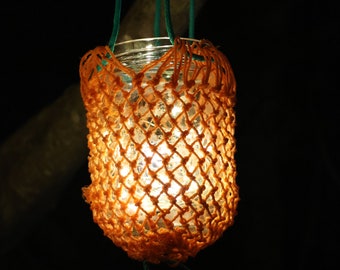 Repurposed lobster bait bag outdoor lantern or plant hanger