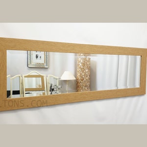 Miroir mural rectangulaire avec cadre en bois, finition chêne OLTONS, verre biseauté 132 x 46 cm Décoration d'intérieur moderne sur toute la longueur Design long Fabriqué au Royaume-Uni
