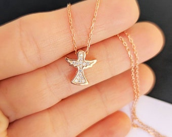 Collana con angelo in oro 14 carati: gioiello religioso delicato