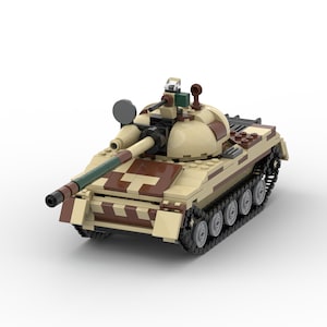 May include: A beige and brown camouflage toy tank with a green barrel and black wheels.