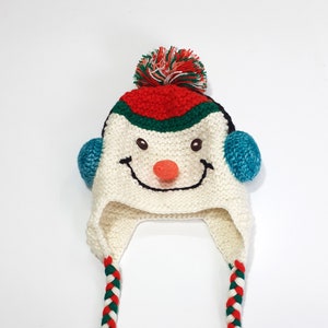 Children&#39;s hat in snowman  character.