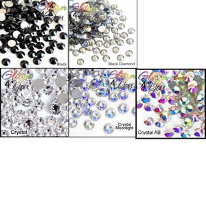 May include: A collection of round, faceted rhinestones in five distinct color variations labeled Glitzer 4 You: solid black, translucent black diamond, clear crystal, iridescent crystal moonlight, and multi-colored crystal AB finish.