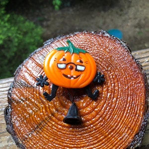 Vintage Plastic Pumpkin Man With Moveable Arms and Legs Pin