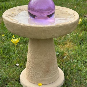 Sandstone fountain birdbath with crystal ball