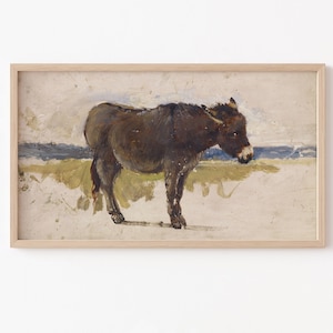 May include: A framed vintage-style painting of a donkey. The artwork features a brown donkey standing in a field with a light blue and white background. The painting is in a wooden frame.