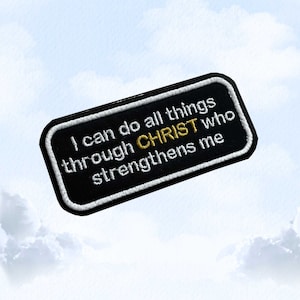 May include: Black and white embroidered patch with white stitching around the edges. The patch says "I can do all things through CHRIST who strengthens me".