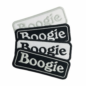 May include: Four black and white embroidered patches with the word "Boogie" in a white font on a black background and a black font on a white background.