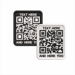 May include: Two embroidered patches featuring QR codes. One is black with white text: "TEXT HERE" and "AND HERE TO". The other is white with black text: "TEXT HERE" and "AND HERE TOO".