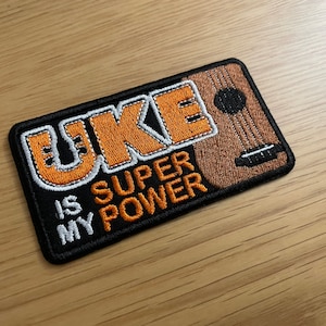 El ukelele es mi superpoder - Parche bordado - 100 mm x 55 mm - Para planchar o coser