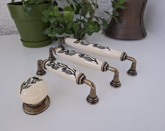 Olive Branch Porcelain Knobs and Pulls: Cream, Antique Bronze