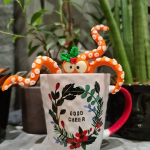 Christmas ,glow in the dark ,plant pot pet octopus, tentacles,Santa hat ,handmade with polymer clay for plant lovers.Small gift, kraken