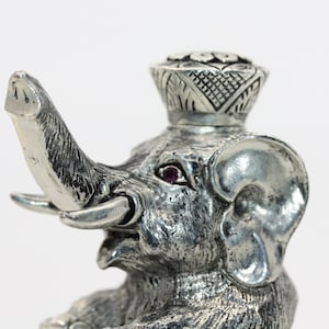 ELEPHANT SCENT PERFUME Bottle Wearing a crown