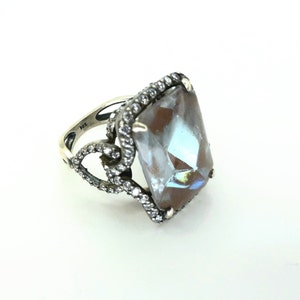 Vintage German 18x13mm Sappharine (octagon or oval) set in 9.25 Sterling ring with many cubic-zirkonias-214
