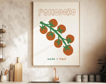 May include: A framed art print featuring a cluster of tomatoes on a green vine against a cream background. The word "POMODORO" is written in orange above the tomatoes, with "MADE IN ITALY" below.