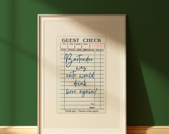 May include: A framed print of a vintage guest check with the text "Bartender was cute would drink here again!" printed in blue ink.