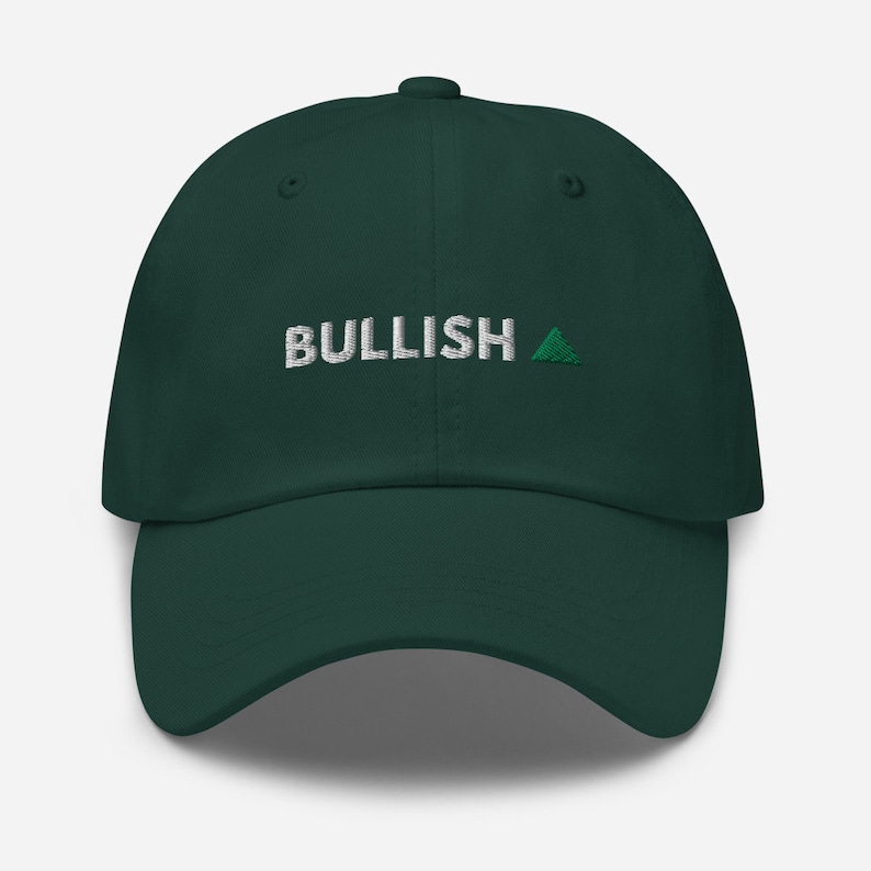 May include: A dark green baseball cap with the word "BULLISH" embroidered in white and a green upward pointing triangle.
