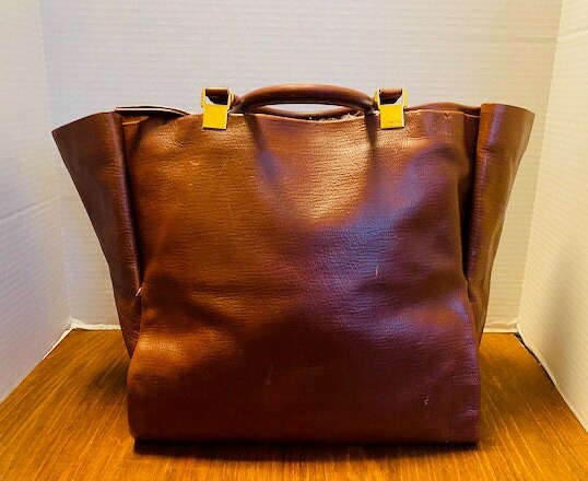 LANVIN Medium Brown Suede Braided Fringe Gold Logo Embossed Tote Bag