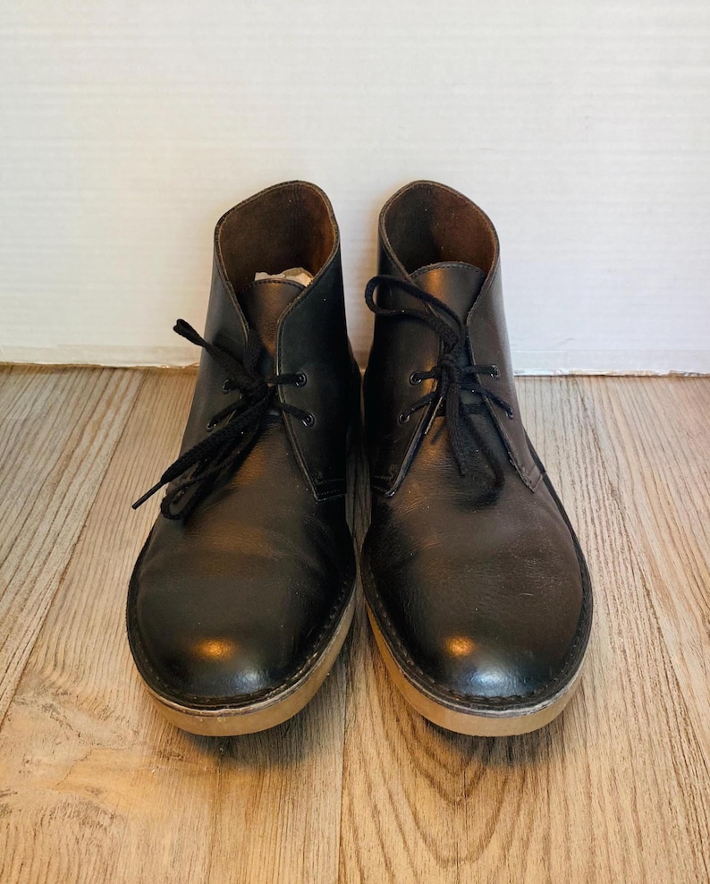 May include: A set of three ceramic nesting bowls in shades of blue, green, and white. The bowls feature a speckled glaze and a simple, modern design. The largest bowl measures approximately 8 inches in diameter.