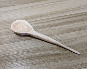 Hand carved wooden spoon