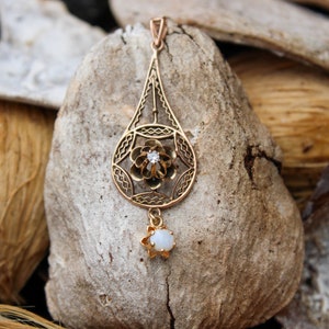 Art Nouveau opal and diamond pendant, 9ct gold
