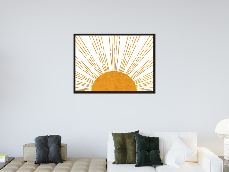 Puede incluir: Una impresi&oacute;n enmarcada de un sol estilizado con rayos naranjas sobre un fondo blanco.