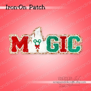 May include: An iron-on patch featuring the word MAGIC in a varsity-style font. The M is red, the A is a white castle silhouette with a green wreath icon, the G is green, the I is red, and the C is green. All letters have a gold glitter border.