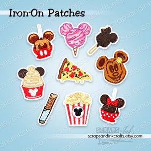 May include: A collection of iron-on patches featuring various food items and Mickey Mouse-themed designs. Includes a Mickey-shaped ice cream, cotton candy, pizza slice, popcorn, and churro. The patches are colorful and detailed.
