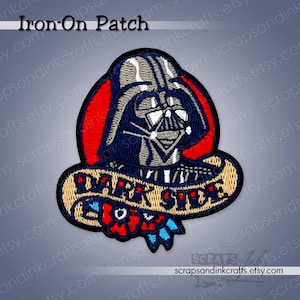 May include: A set of three ceramic mugs with a speckled, cream-colored glaze. Each mug features a different hand-painted floral design in shades of blue, green, and yellow. The mugs have a simple, rounded shape and a comfortable handle.