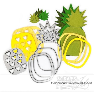 May include: A set of die-cut pineapple shapes in yellow, green, and silver. The set includes a pineapple with a heart-shaped pattern, a pineapple with a zig-zag pattern, and a pineapple with a solid green color. The set also includes a pineapple top, a pineapple base, and a pineapple leaf. The set is perfect for crafting and scrapbooking. SCRAPS & INK SCRAPSANDINKCRAFTS.ETSY.COM