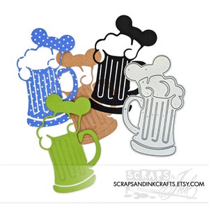 May include: Four different die-cut beer mug shapes, one in black, one in silver, one in green, and one in blue with white polka dots. The die cuts are for crafting and scrapbooking.