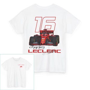 May include: White t-shirt with a red and white Formula 1 race car graphic on the back. The car has the number 16 on it and the name "Charles Leclerc" is printed below the car.