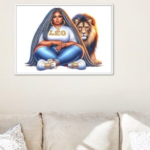 May include: A framed art print depicting a woman with long braided hair, wearing a white t-shirt with "LEO" in gold letters, blue jeans, and trainers. A lion is positioned behind her. The artwork is set against a white background.