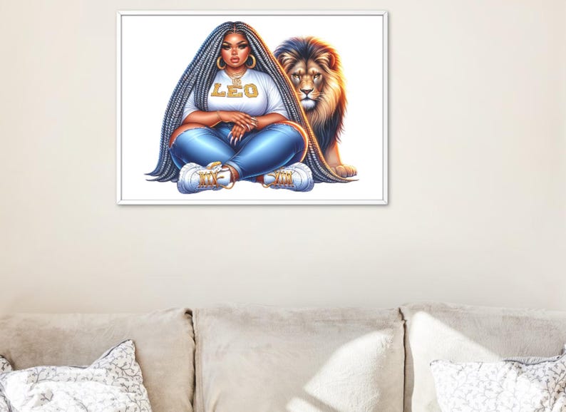 May include: A framed art print depicting a woman with long braided hair, wearing a white t-shirt with "LEO" in gold letters, blue jeans, and trainers. A lion is positioned behind her. The artwork is set against a white background.