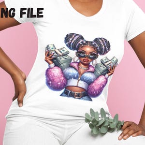 May include: A white t-shirt with a graphic print of a cartoon woman with pink hair and sunglasses holding stacks of money. The woman is wearing a blue and white jacket and a pink fur coat.