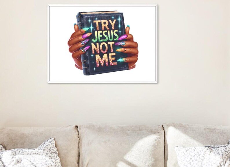 May include: A black book with glitter and the words "TRY JESUS NOT ME" on the cover. The book is being held by two hands with colorful, glittery fingernails.
