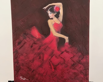 May include: A painting of a woman in a red dress dancing. The background is a dark red with a textured surface. The woman has a red flower in her hair.