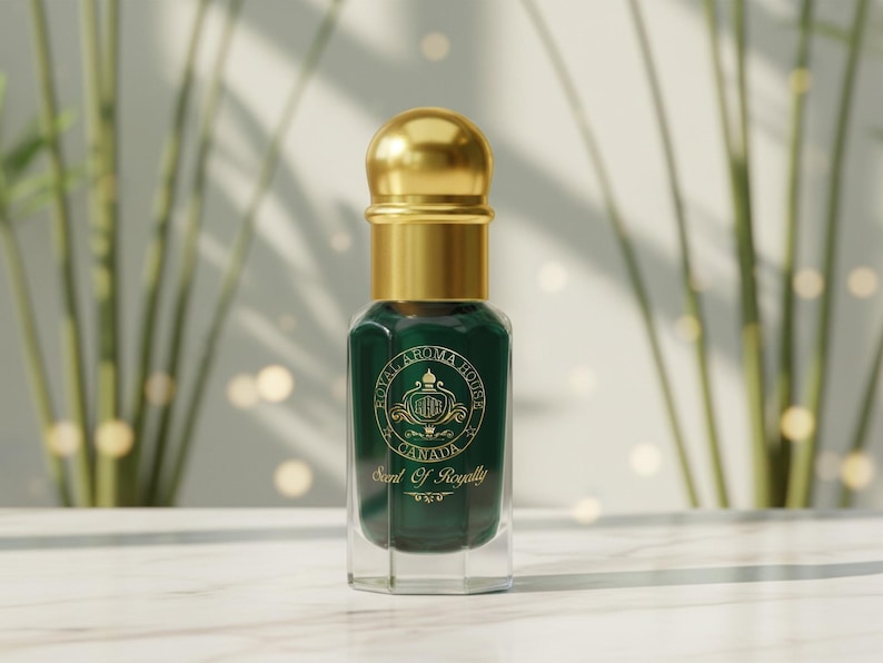 May include: A dark green perfume bottle with a gold cap and accents. The bottle has a clear, geometric base and a label with gold text. The background features blurred greenery and soft lighting, creating a luxurious aesthetic.