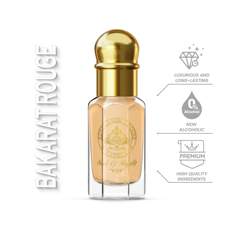 May include: A perfume bottle with a gold cap and accents, filled with a light peach-coloured liquid. The bottle has the text "BAKARAT ROUGE" vertically on the left side. Additional text includes "ROYAL AROMA HOUSE CANADA" and "Scent Of Royalty".