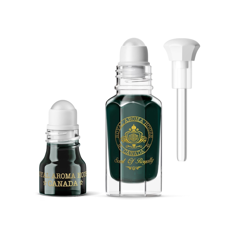 May include: Two glass perfume bottles with white caps and dark green liquid. One bottle has a rollerball applicator, the other has a dropper. The bottles have gold text that reads "Royal Aroma House Canada" and "Scent of Royalty".