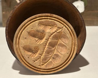 Primitieve houten eikelbotervormpers