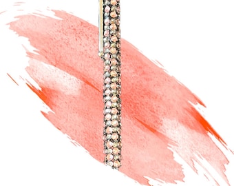 Stift in schwarz mit rosa und dunkelgrauen Strasssteinen