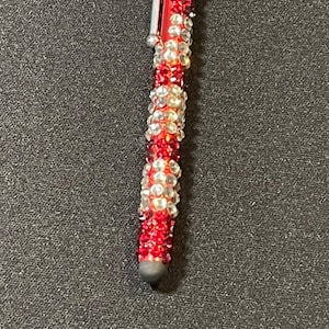 Stylus that is bedazzled with red and crystal rhinestones delta sigma theta colors