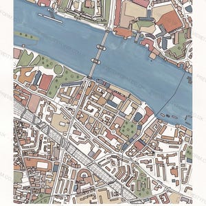 A finished, coloured-in Canary Wharf map — the real streets, docks and tower outlines of London's Docklands, filled by hand