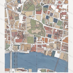 A finished, coloured-in Tower Bridge map — the real streets and building outlines around the Tower of London and Tower Bridge, filled by hand