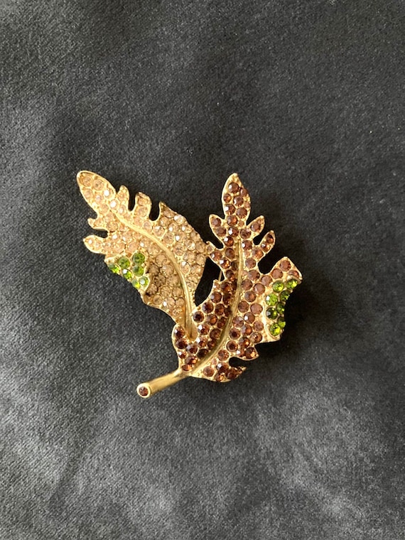 Kjl brooch shop