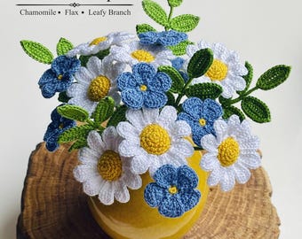 May include: A crochet flower bouquet featuring white chamomile, blue flax, and green leafy branches in a yellow vase. The text reads: Flower Bouquet, Chamomile, Flax, Leafy Branch, Natalia Erkhova, Crochet Pattern.