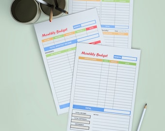 May include: Printable budget planner sheets with colorful headings and lines for tracking income and expenses. The sheets are labeled "Monthly Budget" and "Weekly Expense Tracker".